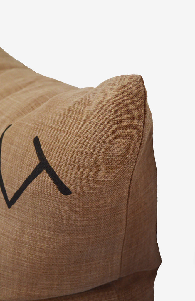 Signs + Signifiers Throw Pillow on Linen